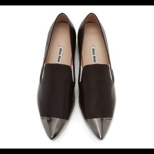 Miu Miu
Black Toe Cap Platform Slip-On Sneakers